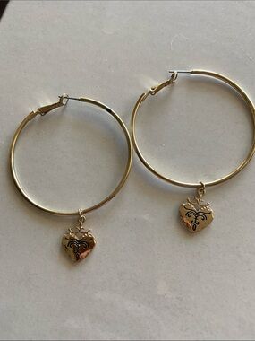 Medium sized hoop earrings with dangly heart